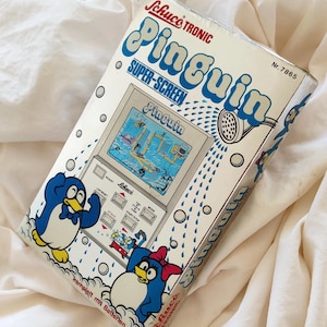 SCHUCO EPOCH, &quot;Pinguin&quot;, &quot;Pengoro&quot;, boxed LCD handheld, vintage game console, Schucotronic, 80s retro collectors german