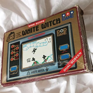 Juego Pop MATSUSHIMA "White Witch", pantalla LCD dual, juego LCD multicapa, juego de cartas, juego portátil, juego retro portátil, importación japonesa