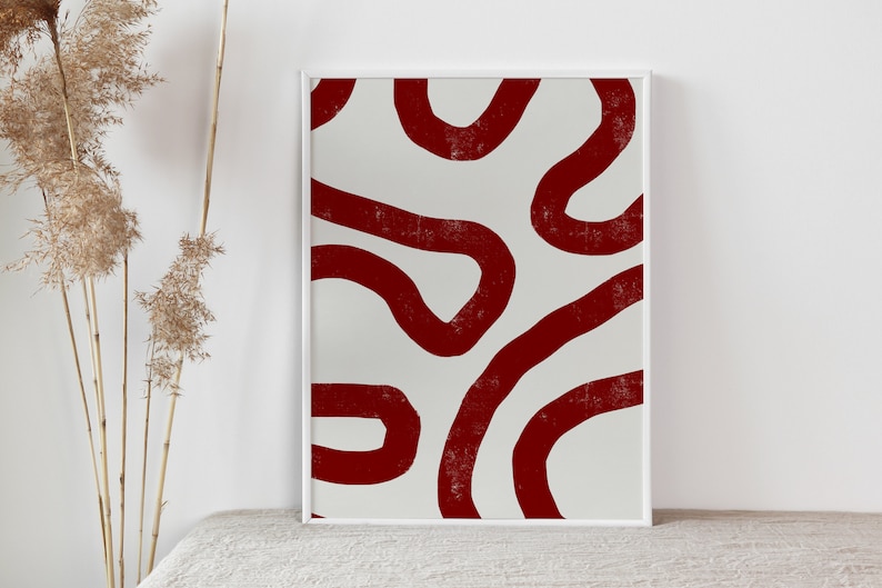 May include: Abstract art print with a white background and red squiggly lines.