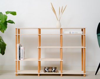 Mid-century modern bookshelf with contemporary minimalist style functionality. Custom design hand-made modular storage unit.