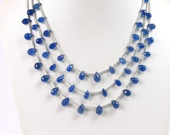 Perles Briolette En Tanzanite Naturelle - Forme Larmes Lisses - Longueur 9 Pouces (env. 23 Cm) - Poids Total 99 Carats