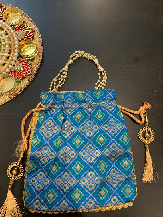 Designer Potlis for Any Occasion | Gifts for women