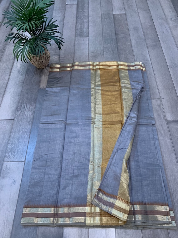 Exquisite Raw Silk Saree in Silver with Chit Pallu