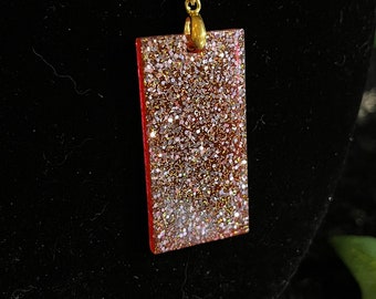 Red glittery resin rectangular pendant necklace