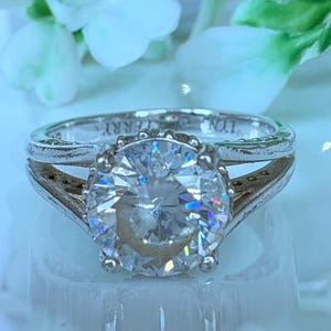 Vintage, Sterling silver and Cubic Zirconia ring. Stamped 925 and super sparkly!