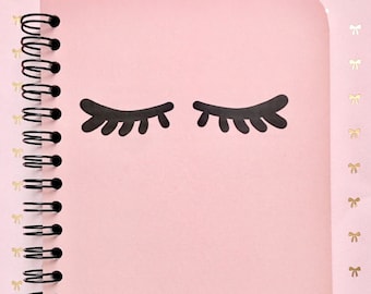 Small spiral notebook