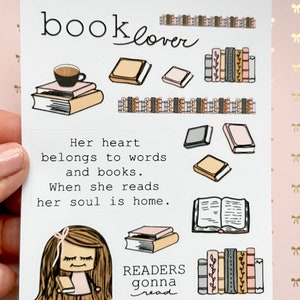 May include: A set of book-themed stickers with illustrations of books, coffee cups, and a girl reading. The stickers feature the text "oky plans", "booklover", "Her heart belongs to words and books. When she reads her soul is home." and "READERS gonna read".