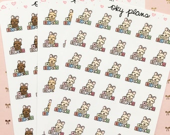 Baby girl play stickers