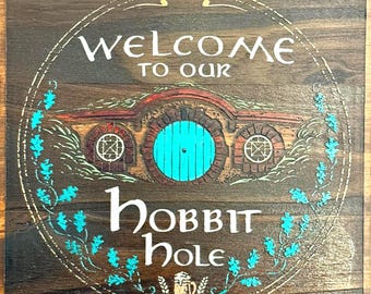 Welcome to Our Hob. Hole Sign