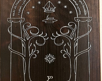 May include: A dark brown wooden plaque with a white engraved design. The design features an archway with columns, stylized trees, stars, and the text "SPEAK FRIEND AND ENTER". The plaque has a rustic, handcrafted appearance.