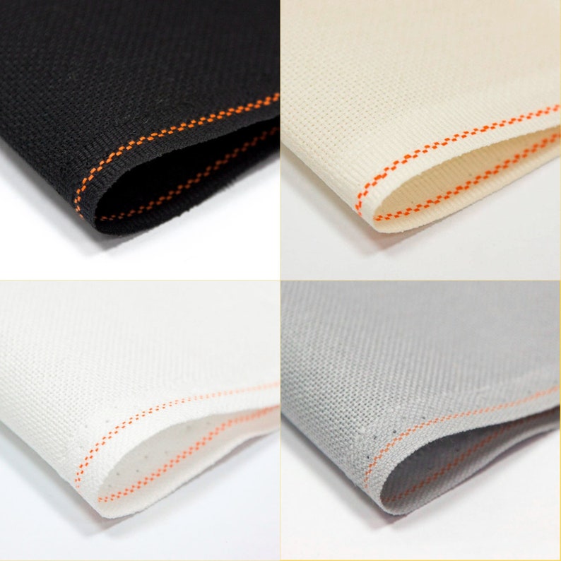 Peut inclure: Quatre &eacute;chantillons de tissu avec des coutures orange. Les &eacute;chantillons sont noirs, blancs, cr&egrave;me et gris.