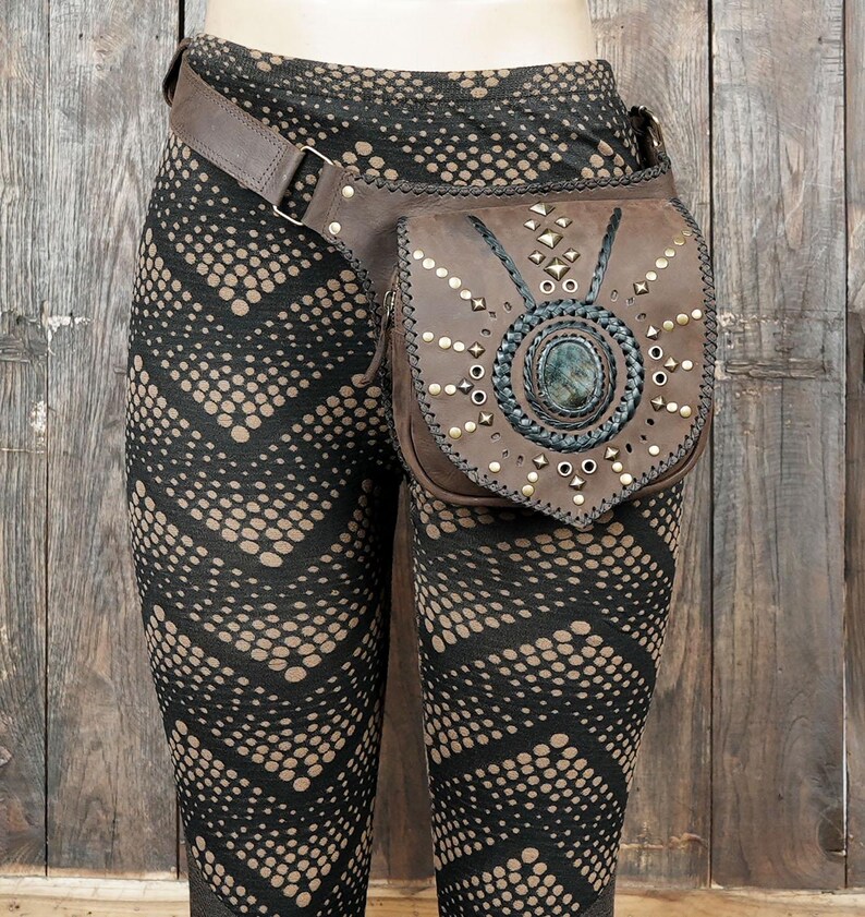 Boho gemstone waist belt bag with handcrafted detailing and brass hardware.