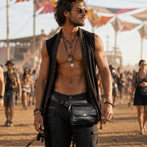 Full layout of brown leather hip bag displaying zippered storage compartment, reinforced hand-stitching, and adjustable waist belt for men and women