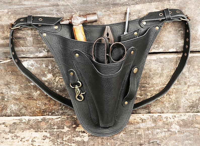 Belt Tool Bag - Worn around the waist to carry tools such as mallets, chisels, and scissors.