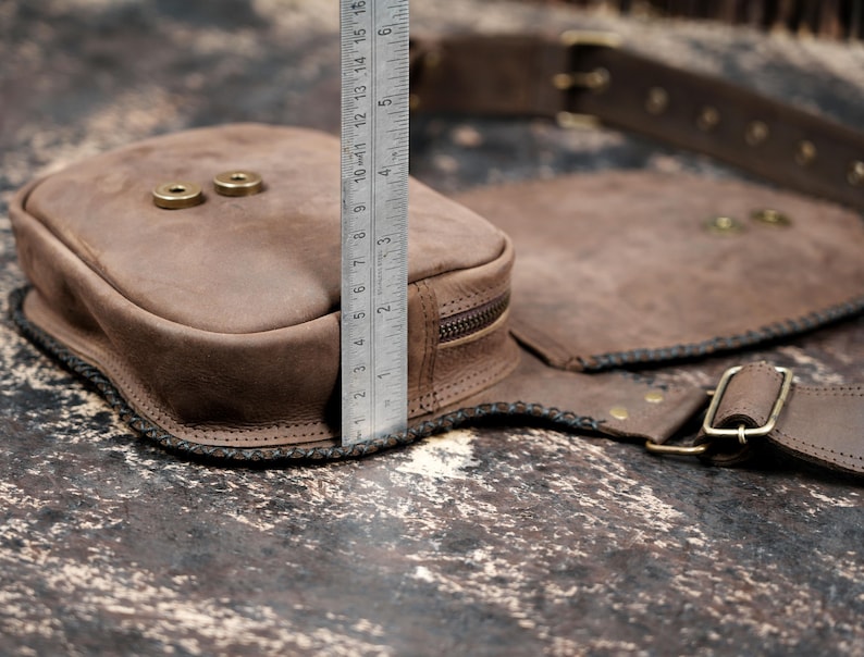Handmade gemstone waist pouch with antique brass studs and adjustable belt.