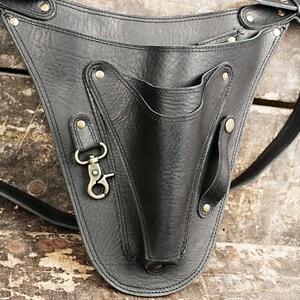 Belt Tool Bag - Worn around the waist to carry tools such as mallets, chisels, and scissors.