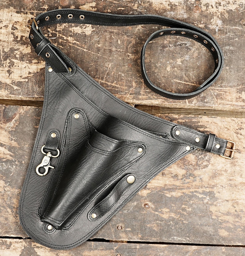 Leather Tool Bag - Sturdy bag for storing tools like hammers, knives, and prying tools.