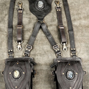 Handcrafted black leather double shoulder holster harness bag set featuring natural labradorite gemstones and antique brass hardware.