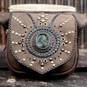 Genuine leather hip pouch with gemstone accent, brass studs, and boho design.