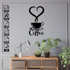 May include: Black metal wall art featuring a coffee cup with a heart-shaped steam rising from it. The word "Coffee" is written in a stylized font below the cup.