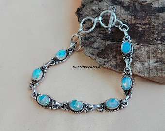Ethiopian Opal Bracelet: Oval Gemstone, Sterling Silver Jewelry