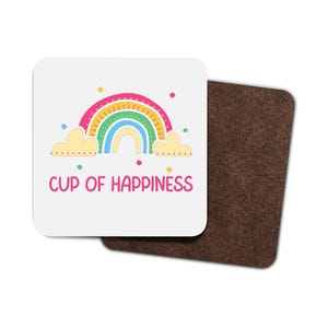 May include: White coaster featuring a colourful rainbow and clouds, with the text "CUP OF HAPPINESS" in pink.