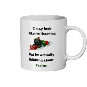 I may look like im listening trains mug