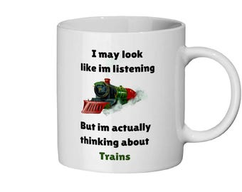 I may look like im listening trains mug