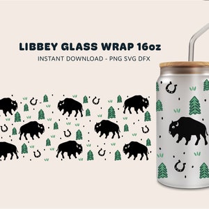 May include: A silver 16oz can with a wood lid and a clear drinking straw. The can has a repeating pattern of black buffalo, green pine trees, and horseshoes on a white background. The text "LIBBEY GLASS WRAP 16oz" is at the top of the can. The text "INSTANT DOWNLOAD - PNG SVG DFX" is below the can.
