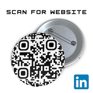 May include: Two round buttons with a QR code design in black and white. The text "SCAN FOR WEBSITE" is above the buttons. A blue LinkedIn logo is in the lower right corner. One button is face up, and the other is face down.