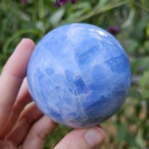 Polished Blue Calcite Sphere: Madagascar Crystal for Peace