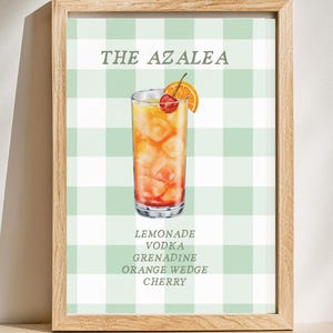 May include: A printable cocktail recipe card with a green and white gingham background. The card features a watercolour illustration of a cocktail called "The Azalea" with a cherry and orange slice garnish. The ingredients are listed below the illustration: Lemonade, Vodka, Grenadine, Orange Wedge, Cherry.