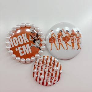 Épinglettes de jour de match de l'Université du Texas