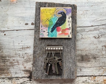 Keys On the fence old barn fencing and original acrylic painting of a black bird found objects mixed media assemblage