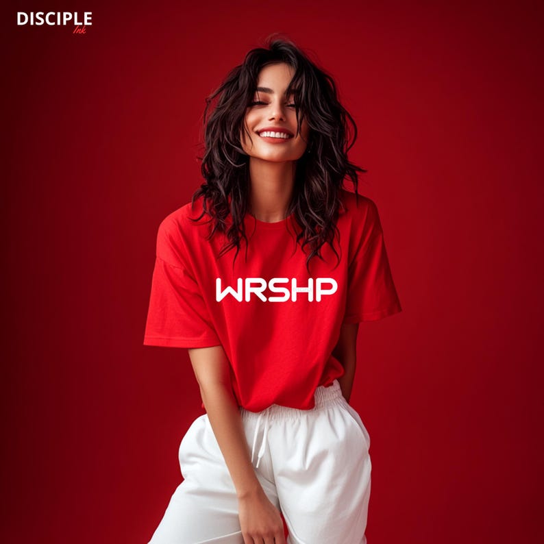 May include: A red t-shirt with the word 'WRSHP' printed in white on the front.