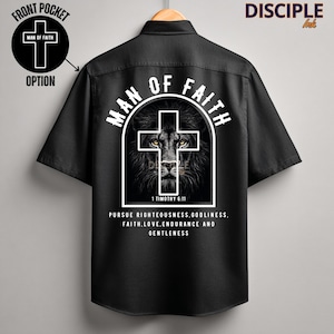 May include: Black short-sleeved button-down shirt with a graphic of a lion's face within a cross, the words "MAN OF FAITH" and "1 Timothy 6:11". The shirt also has the text "PURSUE RIGHTEOUSNESS, GODLINESS, FAITH, LOVE, ENDURANCE AND GENTLENESS".