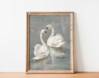 May include: A framed painting depicting two white swans in a grey and blue water setting. The swans are facing each other with their necks curved. The painting is signed "Natasha Tiffany" in the bottom right corner.