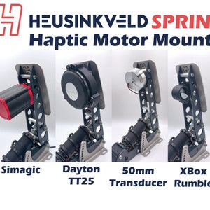May include: Four different haptic motor mounts for sim racing pedals. The mounts are made of metal and have a black finish. The motors are shown mounted to the mounts. The motors are from Simagic, Dayton TT25, 50mm Transducer, and Xbox Rumble.