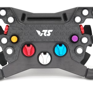 May include: A black racing steering wheel controller featuring the VRS logo in the centre. The device includes multiple circular cutouts, two red thumb dials, a yellow button, a purple button, a red knob, a blue knob, and black paddle shifters.