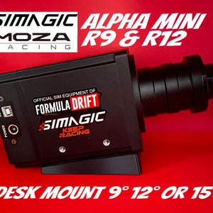 May include: A black and silver camera with a USB and power port. The camera is labelled "SIMAGIC ALPHA MINI R9 & R12" and "OFFICIAL SIM EQUIPMENT OF FORMULA DRIFT". The camera is mounted on a black desk mount with the text "DESK MOUNT 9° 12° OR 15°".
