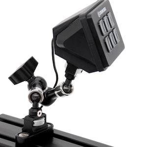 May include: A black Stream Deck controller with six programmable buttons mounted on an adjustable articulated arm. The arm is attached to a black aluminum extrusion rail with a locking knob and a silver tension adjustment wheel at the base.