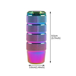 May include: A rainbow-colored metal gear shift knob with a textured surface. It measures 3.7 inches in height and 1.4 inches in diameter.