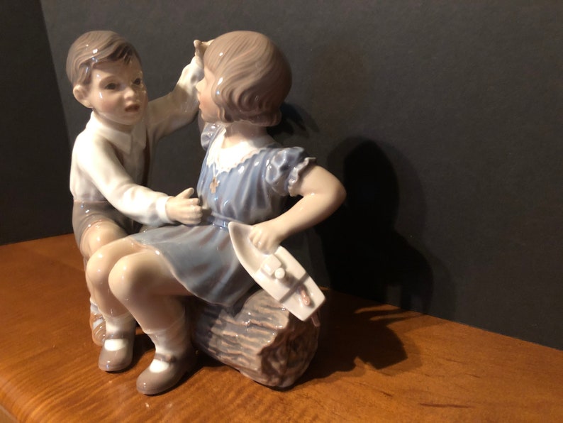 Dahl Jensen Porcelain Figurine Boy and Girl W/ Ship on a Log 1214 1 of