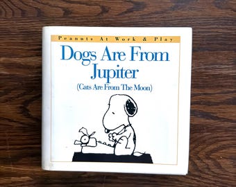 Dogs are From Jupiter (Cats are From Mars) by Charles Schulz (Harper Collins, 1996)