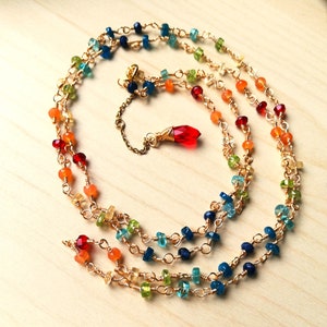 Long rainbow necklace, double row of multicolor stones, handmade in rosary style. Customizable to measure.