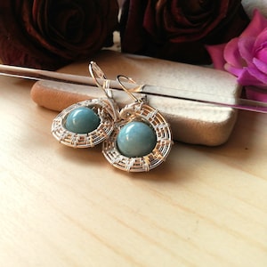 Angelite stone earrings made with wire art technique. Handmade custom made drop earrings in Italy