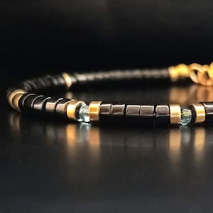 Pulsera minimalista para hombre con cuentas de ónix y topacio y hematita dorada - Joyería artesanal personalizable