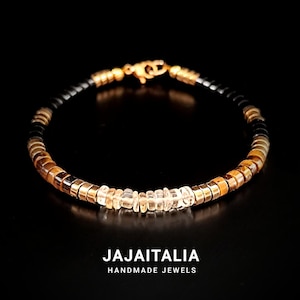Pulsera de cuentas de piedra para hombre hecha a mano con ónix, ojo de tigre, hematita dorada y citrino: elegancia y prosperidad.