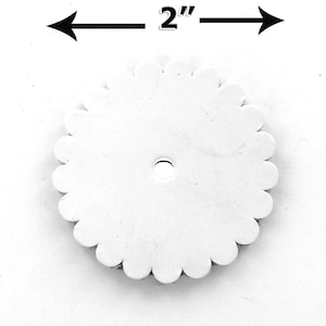 May include: White, 2-inch diameter, scalloped edge, round craft blank with a small hole in the center.