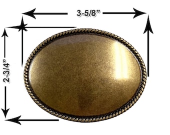 May include: A gold-toned metal belt buckle with a rope-like border. The buckle is oval-shaped and measures 3-5/8 inches by 2-3/4 inches.